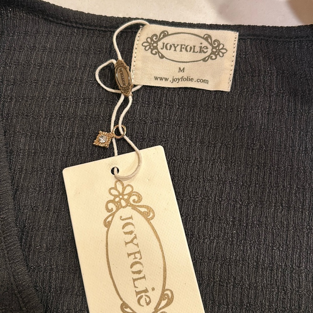 Joyfolie washed black color Henley snap up short sleeve blouse. new with tags.